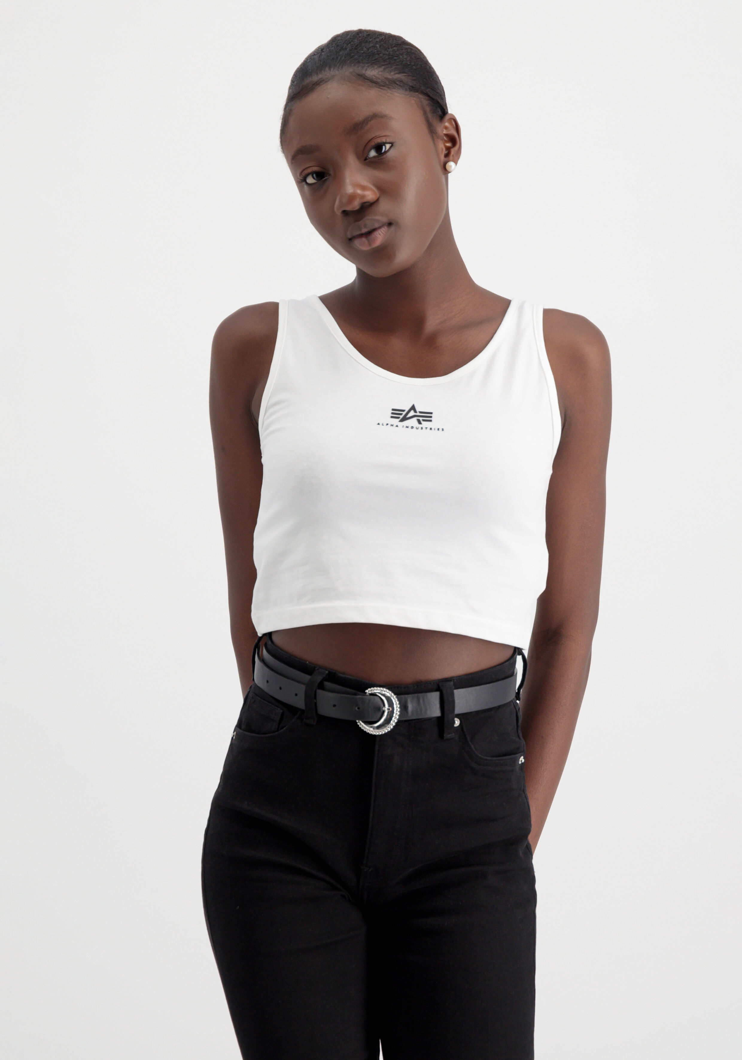 White crop top and black jeans on sale