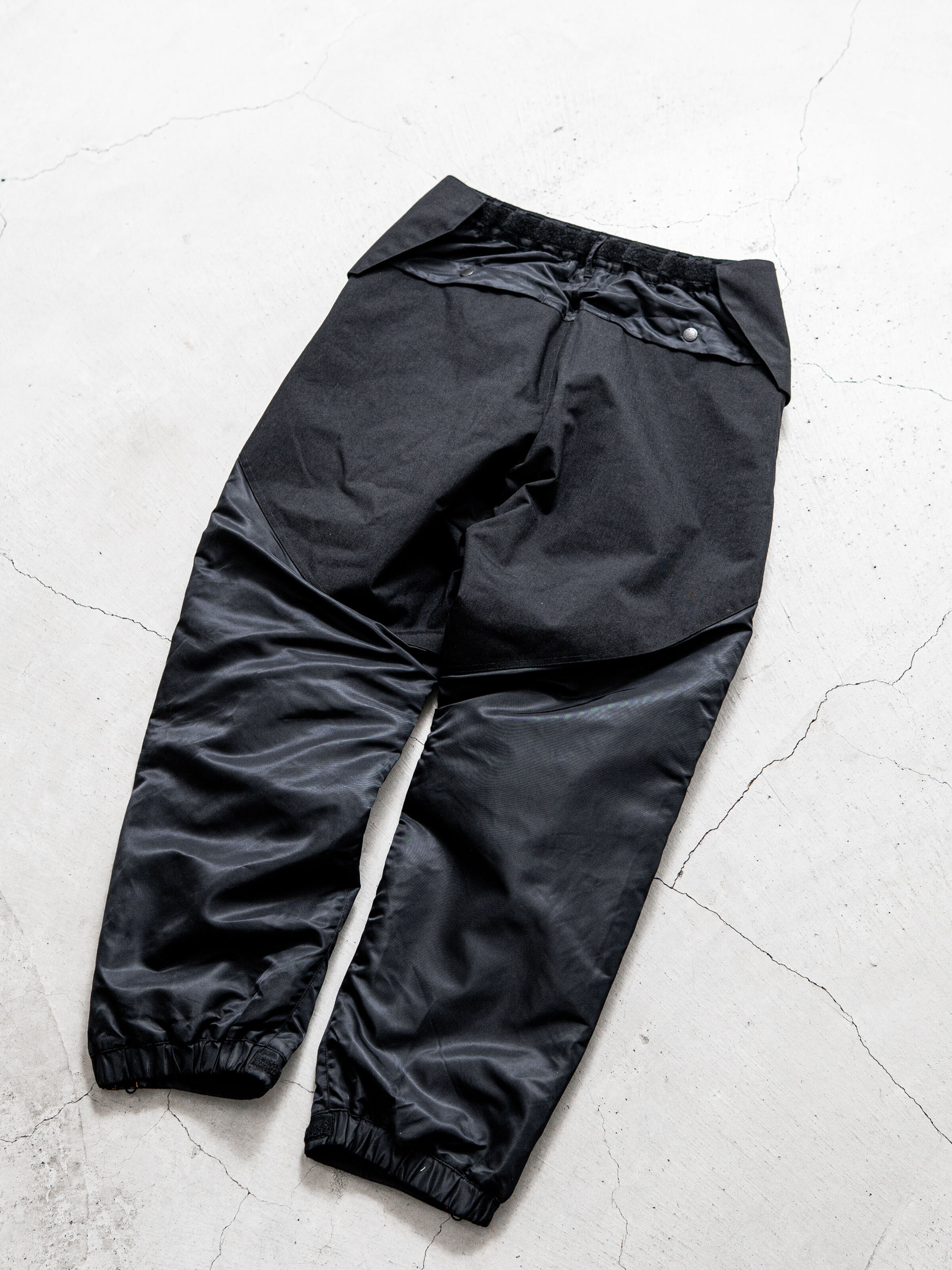 ALPHA x NORBIT Side Opening Padding Samue Pant black 258124_03_1_flatlay_00002_208763